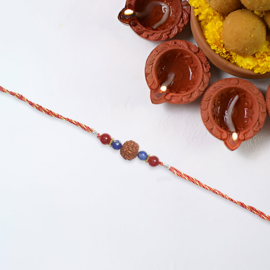 Crystals Rakhi For Creativity ( Rudraksha+ Lapis+ Carnelian ) D No. R-05